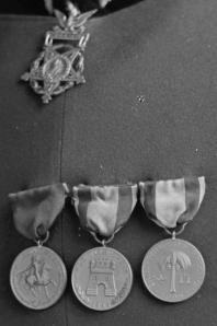 Close up of Brig. Gen. E. A. Garlinton's Medal of Honor, and campaign medals from the Indian Wars, Spanish War and Philippine Insurrection.